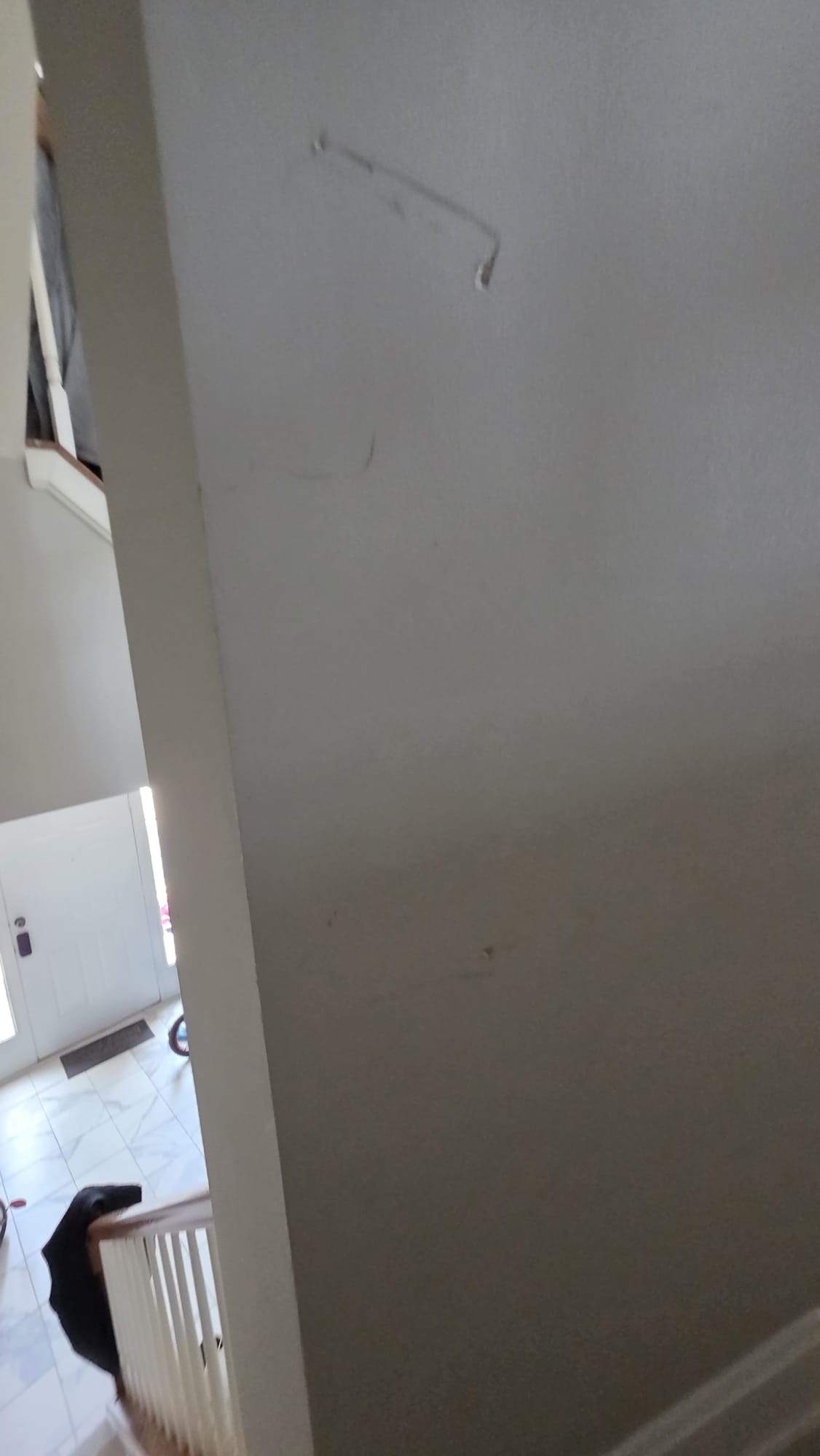 Drywall patching progress by VanGo handyman in Virginia